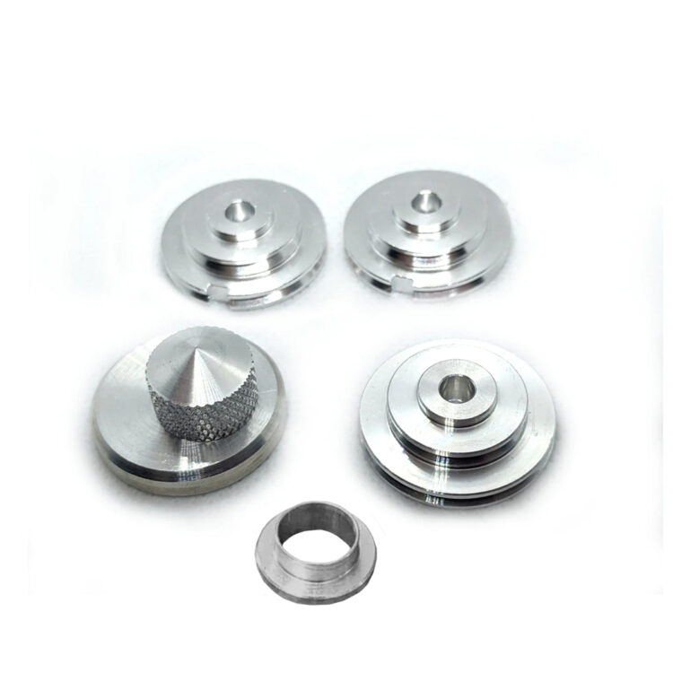 Machined code disks and helmet greeblies.